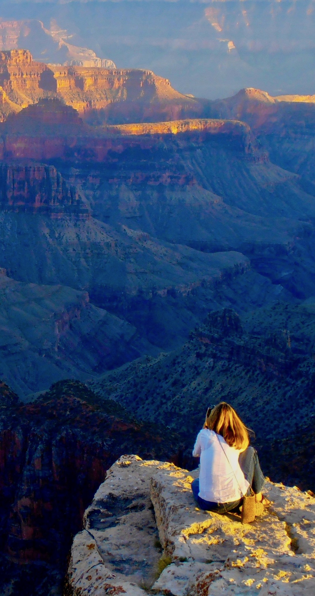 Girl overlooks Grand Canyon